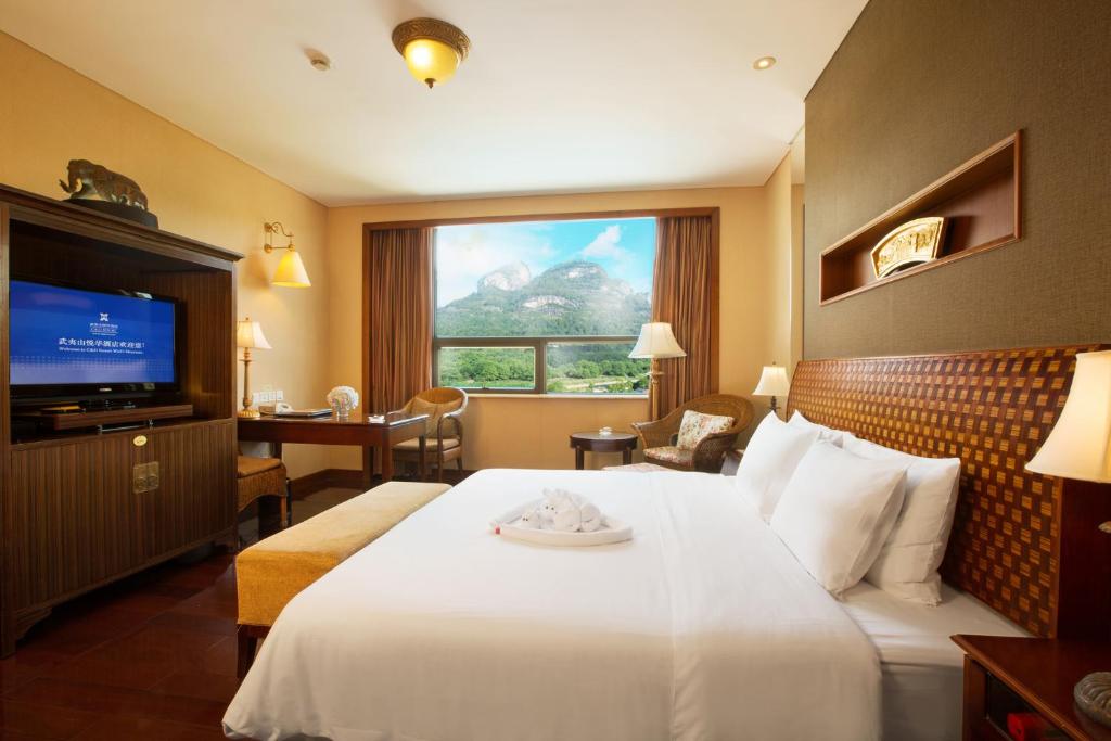 Postel nebo postele na pokoji v ubytování C&D Resort,Wuyi Mountain