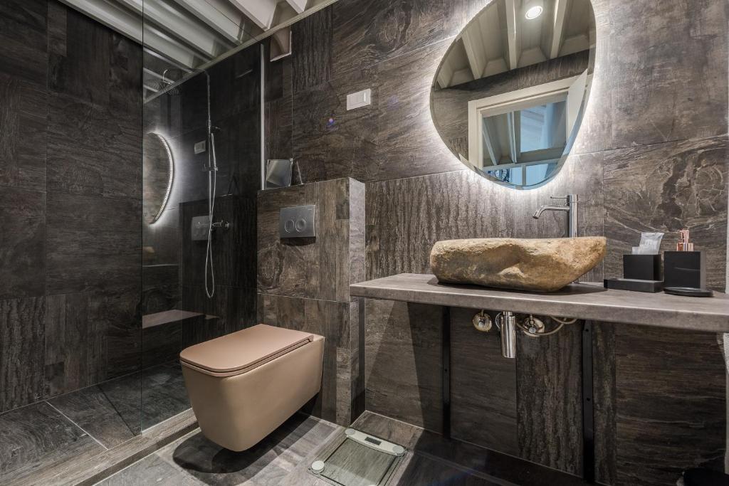 Kúpeľňa v ubytovaní Alma Lofts