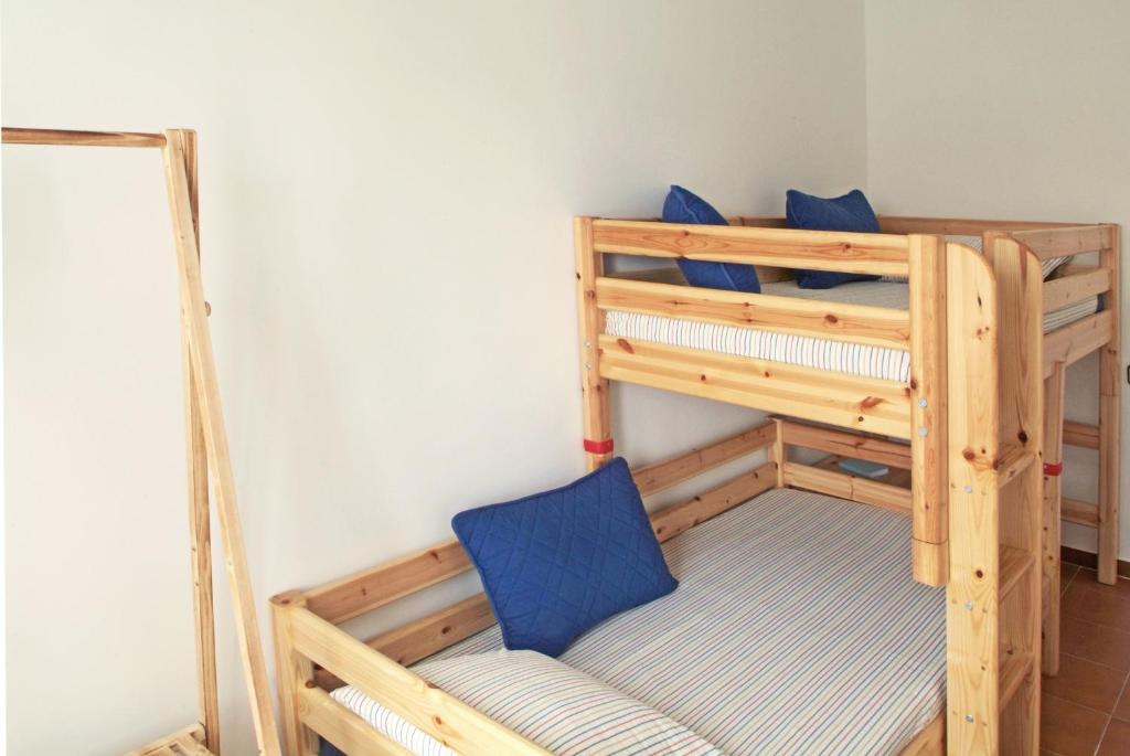 Posteľ alebo postele v izbe v ubytovaní Vivalidays Casa Pinell - Palafolls - Costa Barcelona
