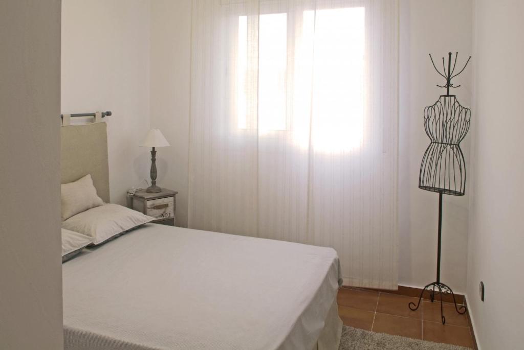 Posteľ alebo postele v izbe v ubytovaní Vivalidays Casa Pinell - Palafolls - Costa Barcelona