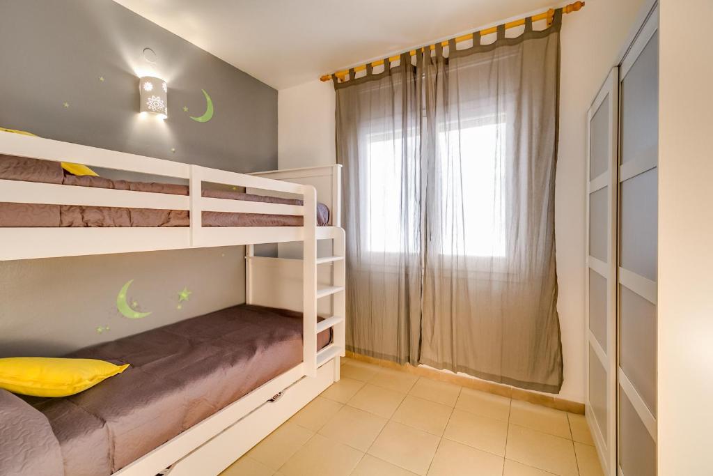 Posteľ alebo postele v izbe v ubytovaní Vivalidays Edurne