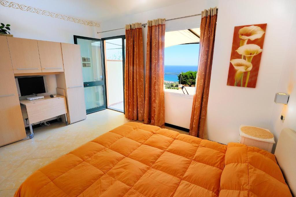 Een bed of bedden in een kamer bij Poggio dei Gorleri