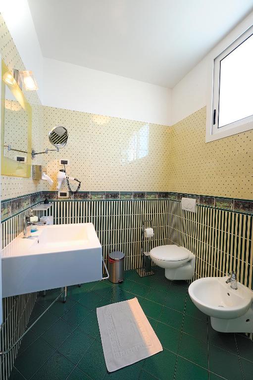 Een badkamer bij Poggio dei Gorleri