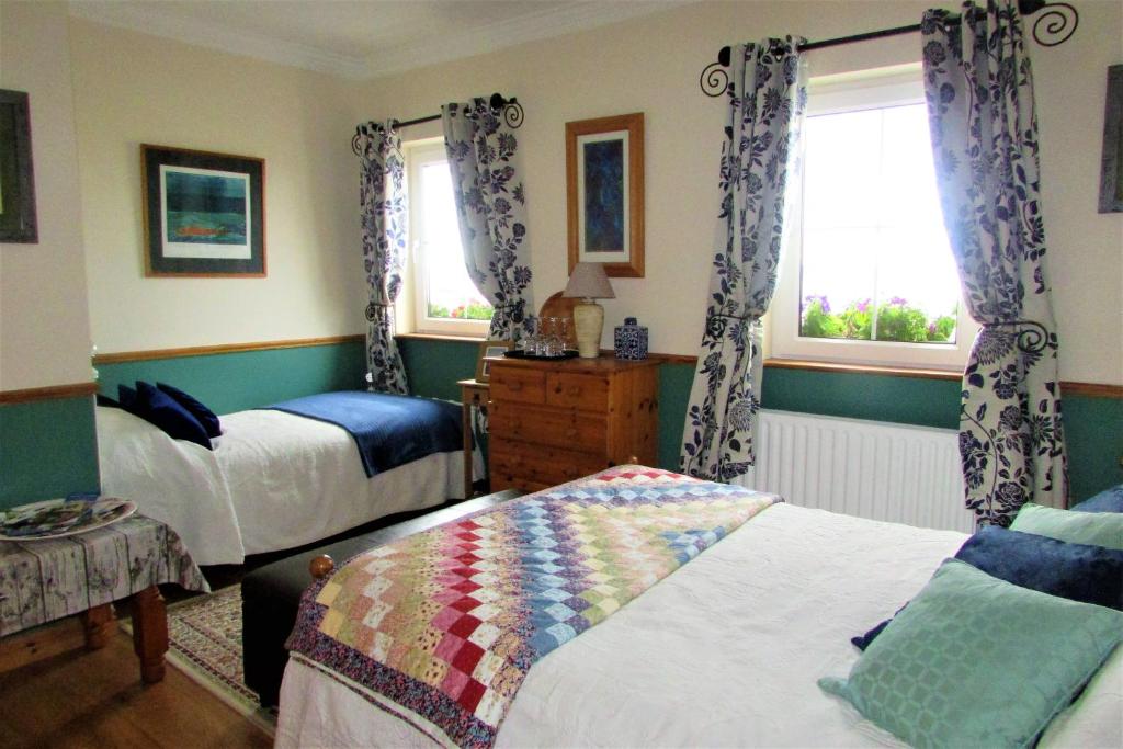 Postel nebo postele na pokoji v ubytování Breacan Cottage B&B