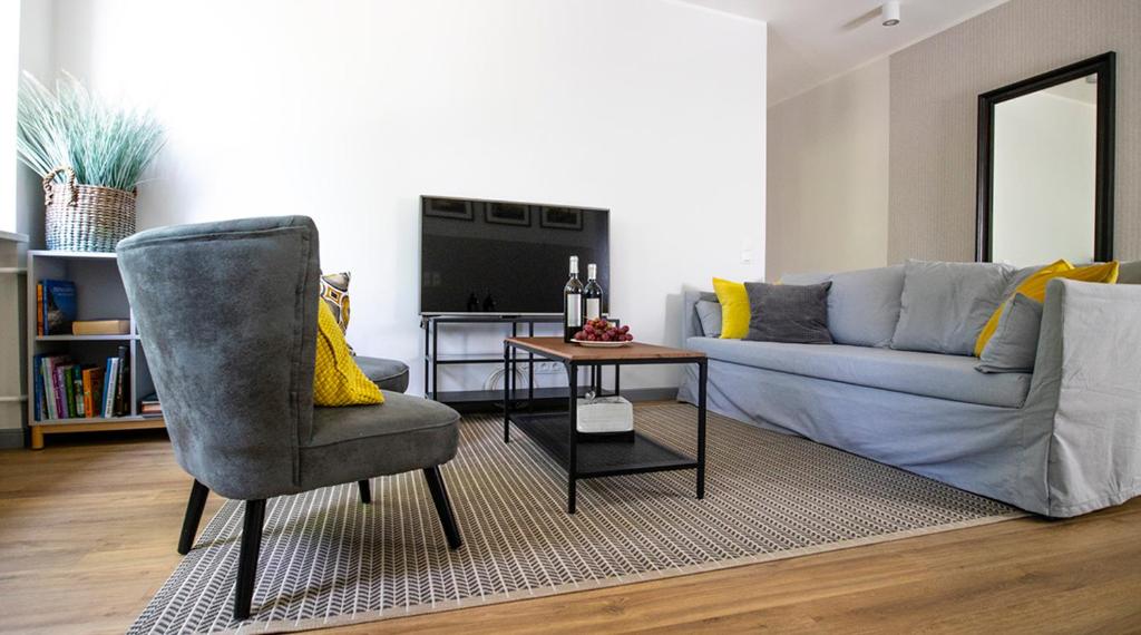 Televízia a/alebo spoločenská miestnosť v ubytovaní A+ apartament Rajska