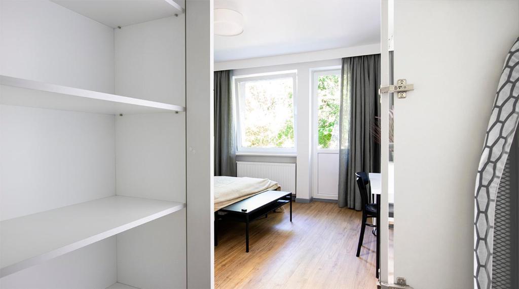 Posteľ alebo postele v izbe v ubytovaní A+ apartament Rajska