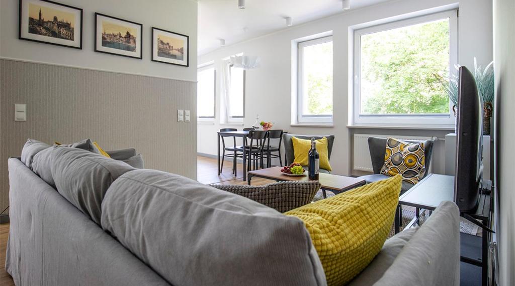 Televízia a/alebo spoločenská miestnosť v ubytovaní A+ apartament Rajska