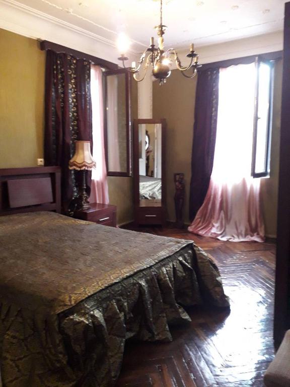 Postel nebo postele na pokoji v ubytování Guest House Temuri