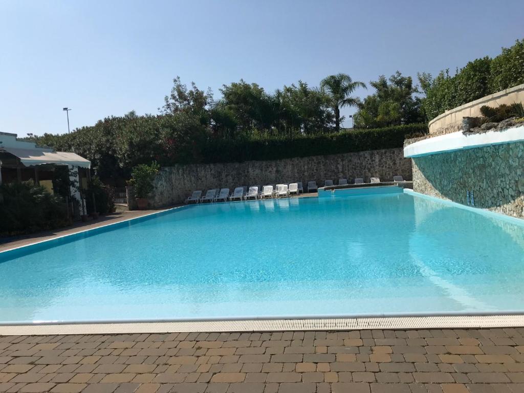 Bazén v ubytování Hotel Club Koiné nebo v jeho okolí