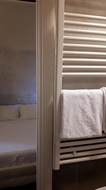 A bed or beds in a room at Cà Doge