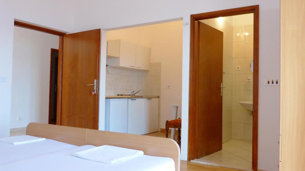 Posteľ alebo postele v izbe v ubytovaní Top floor panorama Stanici