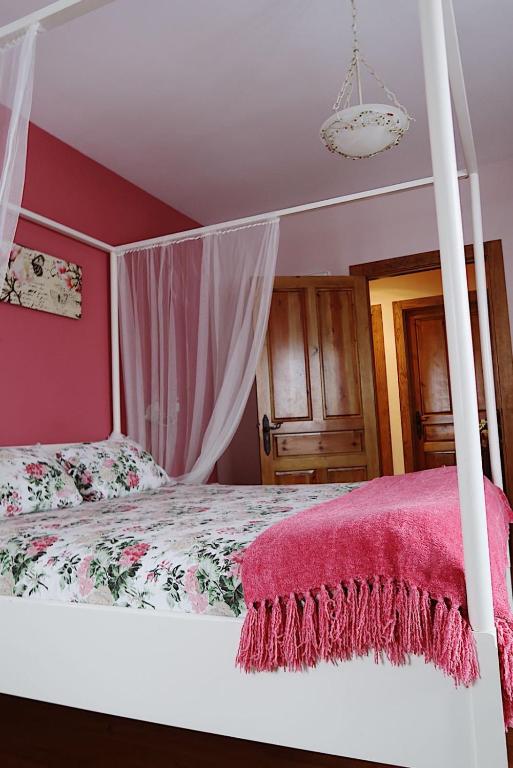 Postel nebo postele na pokoji v ubytování Trisileja en Posada La Busta