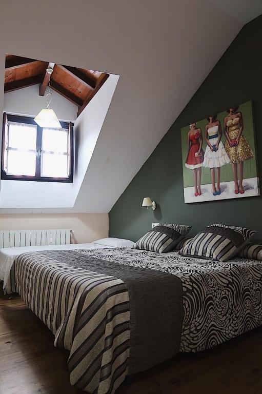 Postel nebo postele na pokoji v ubytování Trisileja en Posada La Busta