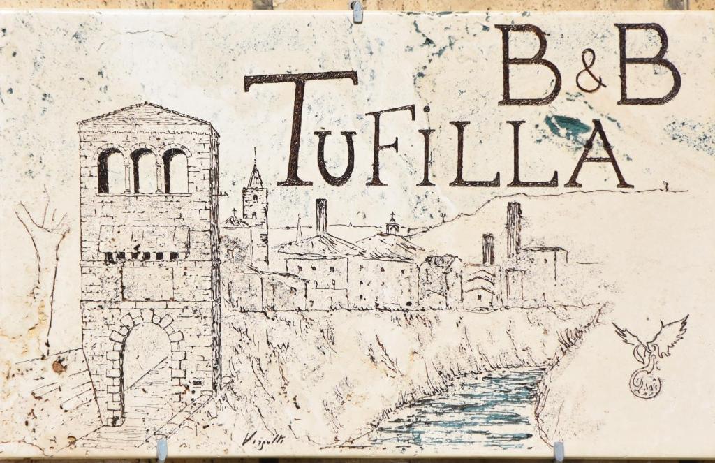Un disegno di una città con le parole "britilia" di B&B Tufilla ad Ascoli Piceno