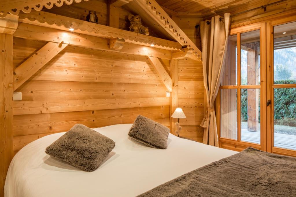 Postel nebo postele na pokoji v ubytování Hôtel Le Labrador