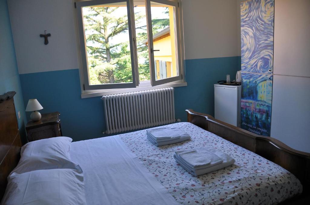 Кровать или кровати в номере Residenza Molinatto
