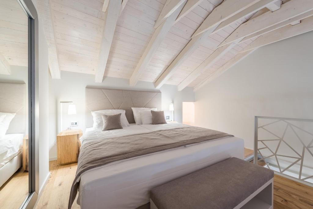 Posteľ alebo postele v izbe v ubytovaní Alma Lofts