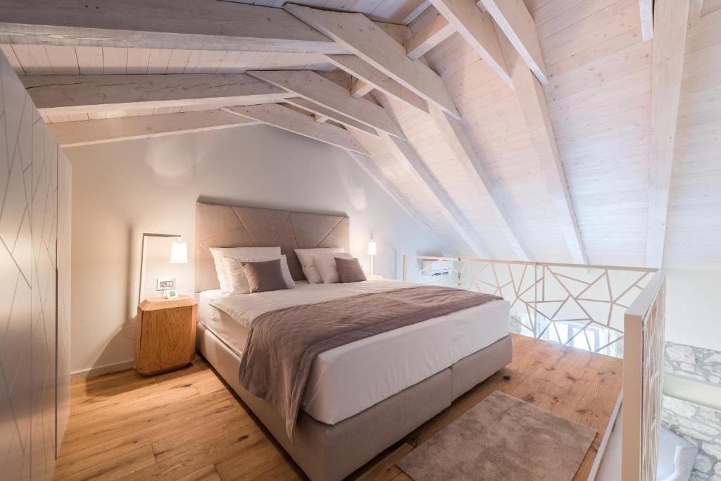 Posteľ alebo postele v izbe v ubytovaní Alma Lofts