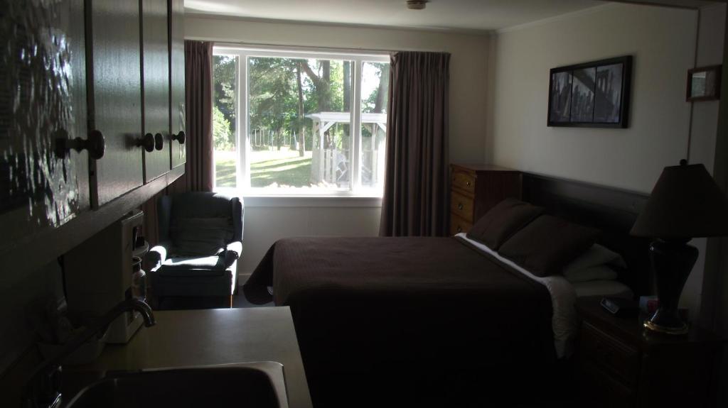Posezení v ubytování Orchard Queen Motel & Rv Park