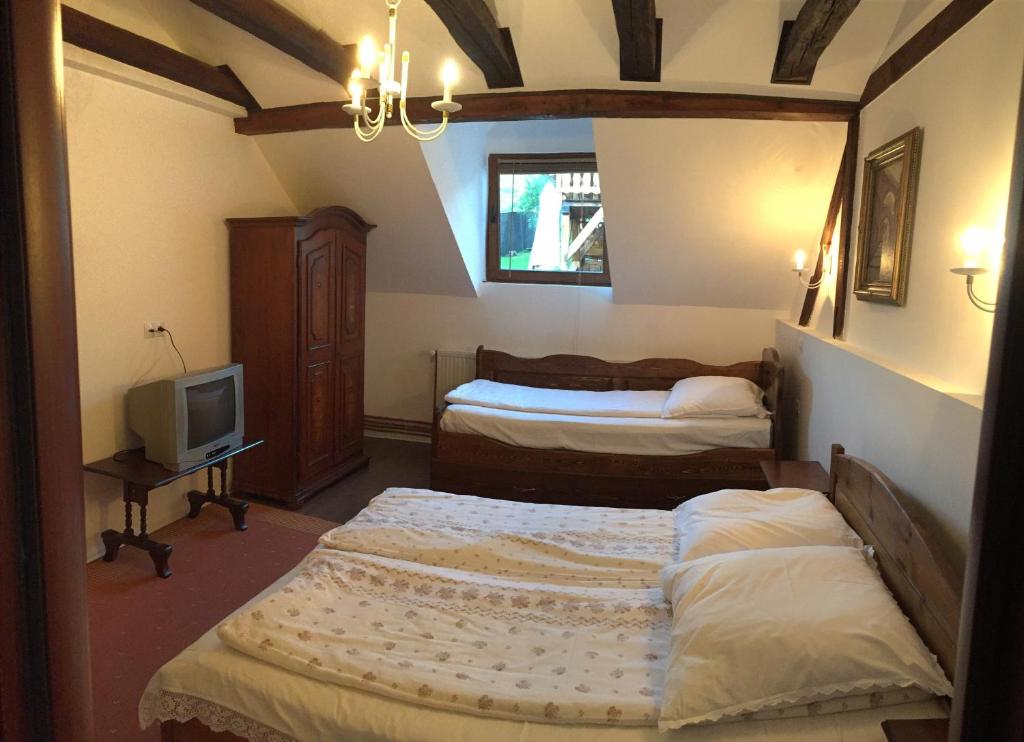 Katil atau katil-katil dalam bilik di Casa Bunicilor