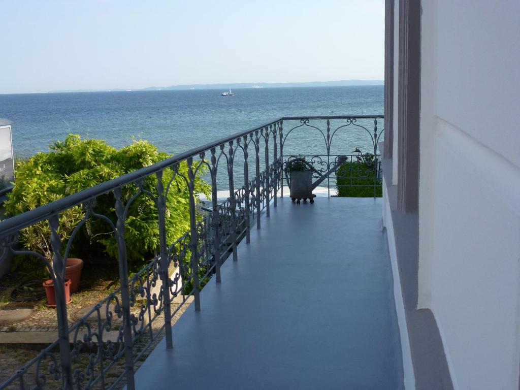 a balcony with a view of the ocean at Ferienwohnung Sassnitz mit Meerblick in Sassnitz