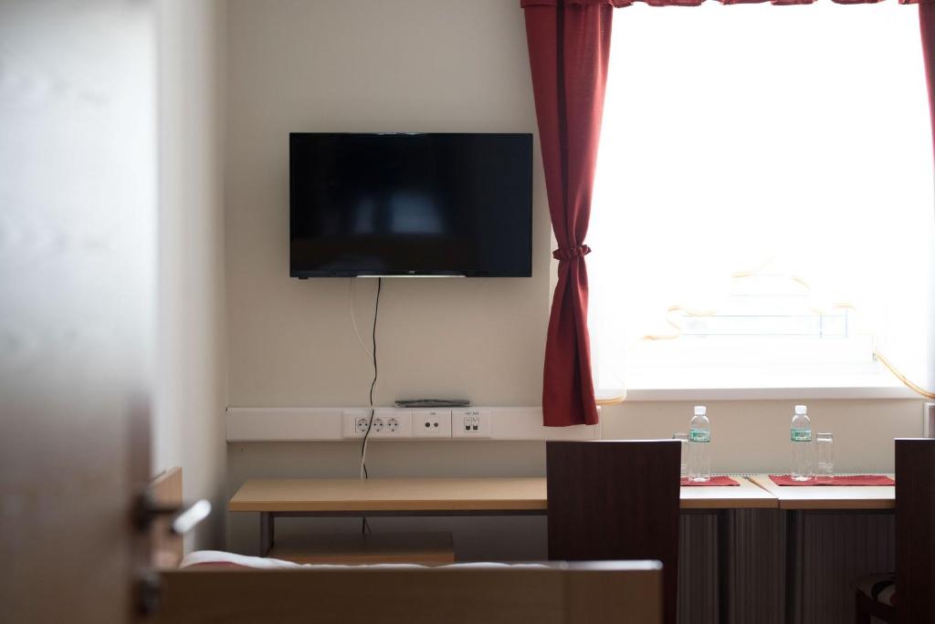 TV a/nebo společenská místnost v ubytování S Hotel