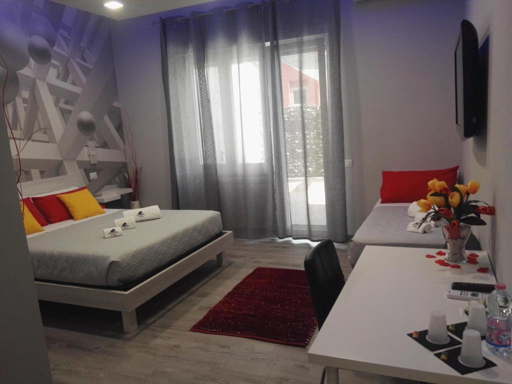 Postel nebo postele na pokoji v ubytování B&B da Lillo