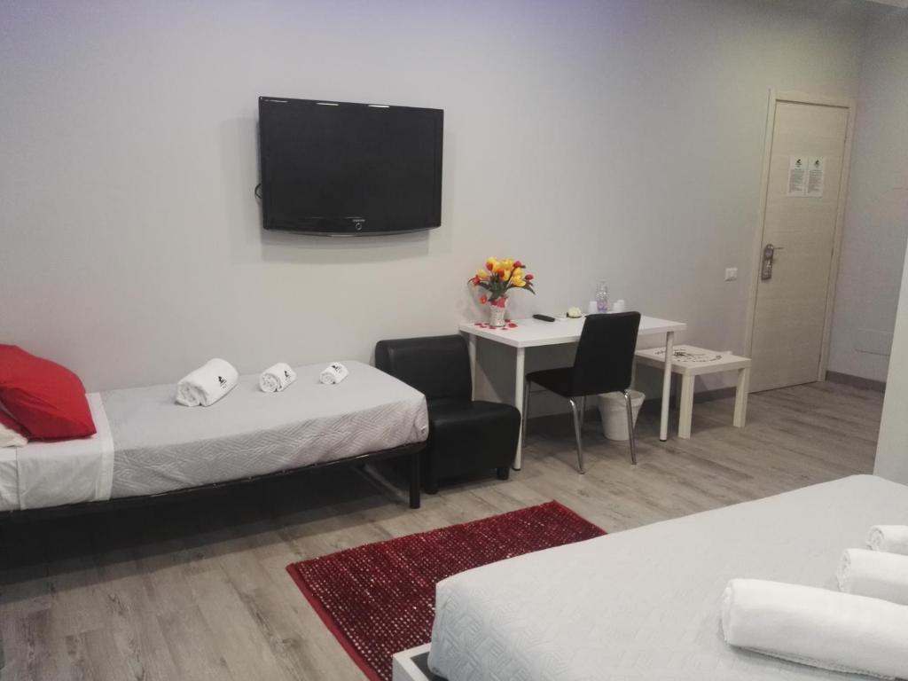 Postel nebo postele na pokoji v ubytování B&B da Lillo