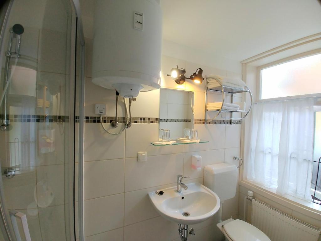 Koupelna v ubytování Hotel garni Paleta