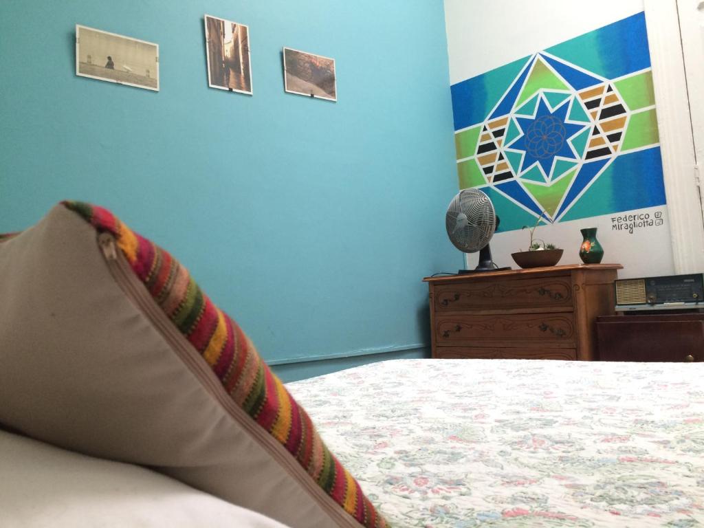 Postel nebo postele na pokoji v ubytování Nómada Eco-Hostal