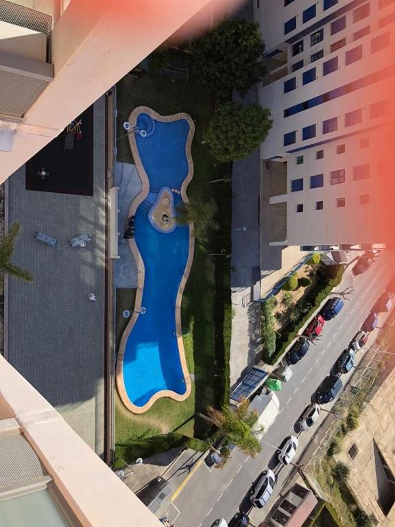 Bazén v ubytování Apartamento en la playa 96 m2 nebo v jeho okolí