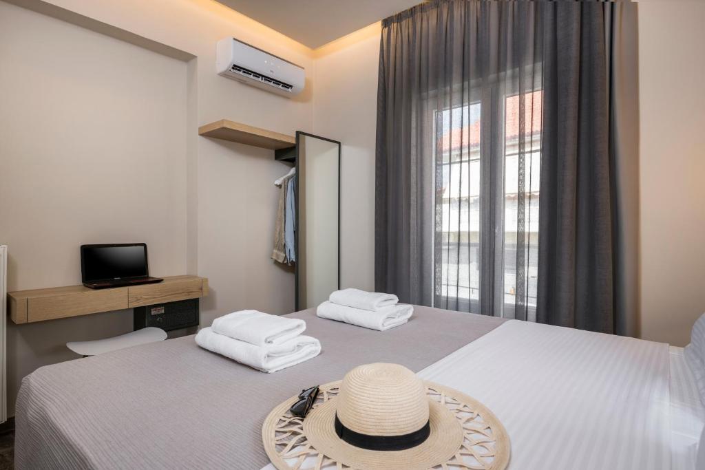Posteľ alebo postele v izbe v ubytovaní Sun Ray Luxury Apartments
