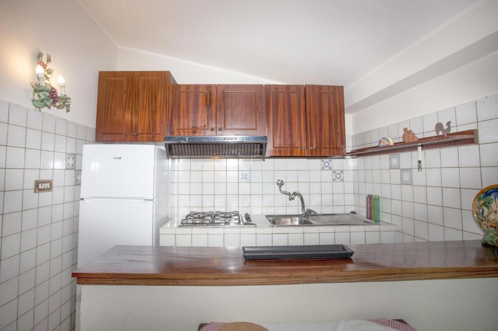 A kitchen or kitchenette at Skyline Appartament