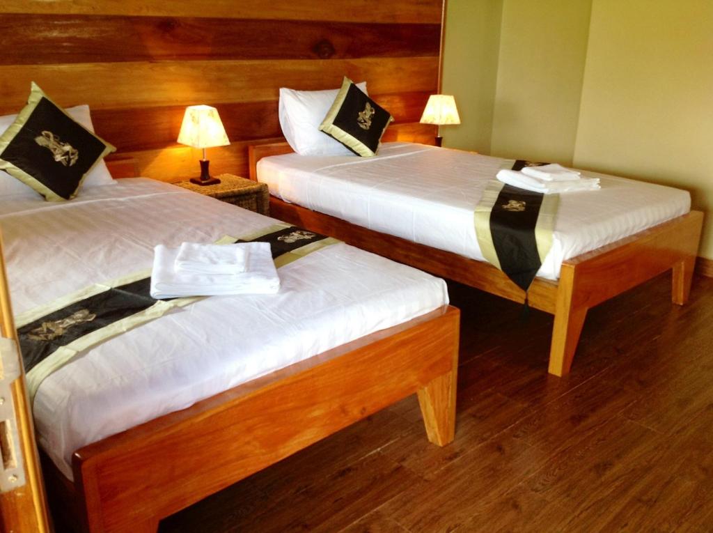 Postel nebo postele na pokoji v ubytování Atmaland Resort
