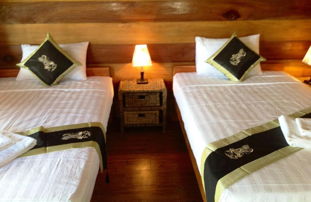Postel nebo postele na pokoji v ubytování Atmaland Resort