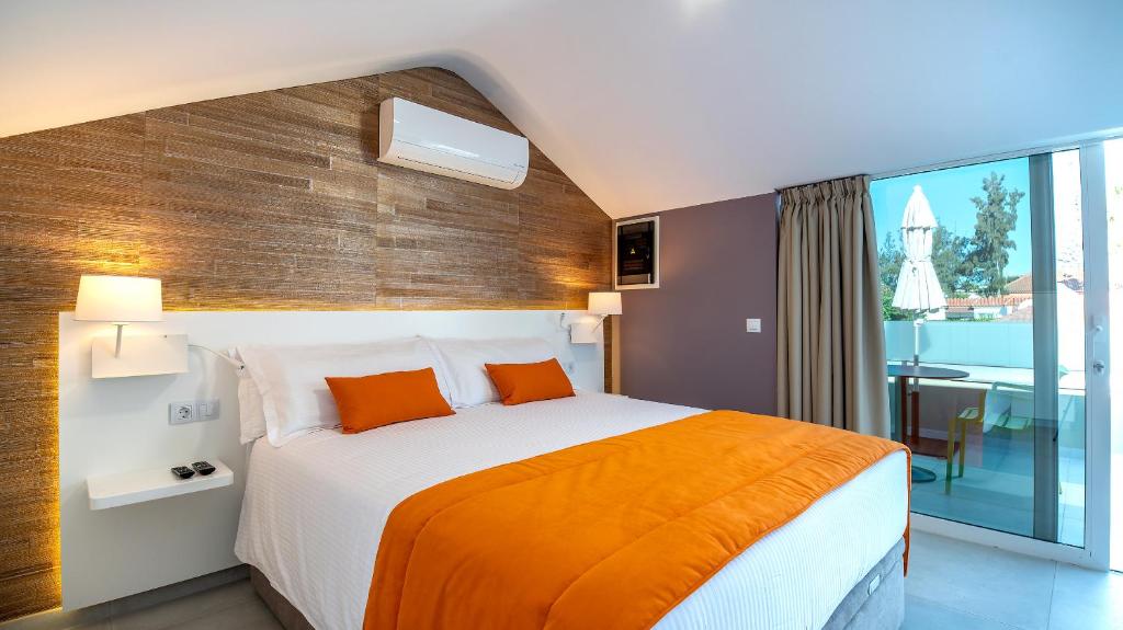 Postel nebo postele na pokoji v ubytování Villa RG Boutique Hotel - Adults Only