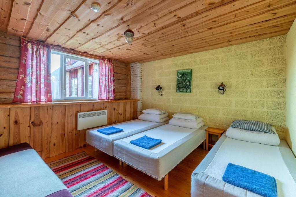 Postel nebo postele na pokoji v ubytování Oitme Hostel