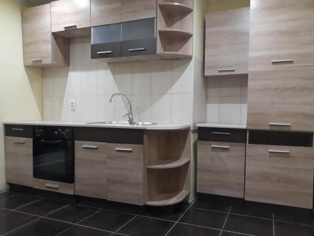 Kuchyň nebo kuchyňský kout v ubytování Eco Resort Nad Karpatamy