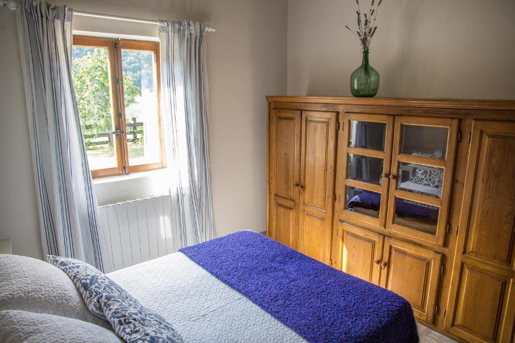 A bed or beds in a room at Excepcional Apartamento El Olivo