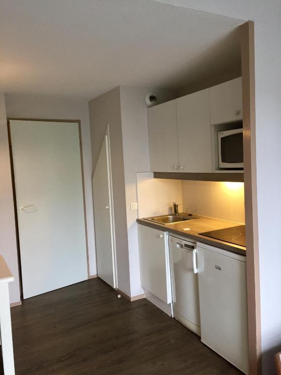 Kuchyň nebo kuchyňský kout v ubytování Appartements Duplex de Charme à Bénodet Vue Mer
