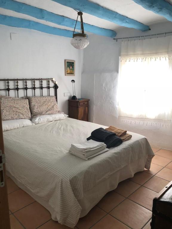 Postel nebo postele na pokoji v ubytování Casa María