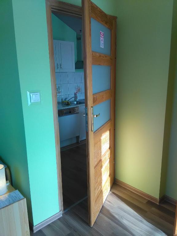Kuchyň nebo kuchyňský kout v ubytování Apartment Helena