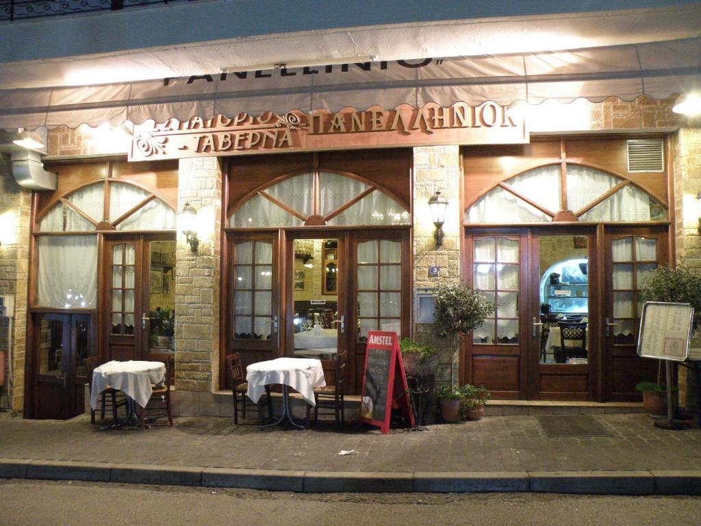 Reštaurácia alebo iné gastronomické zariadenie v ubytovaní Guesthouse Iridanos