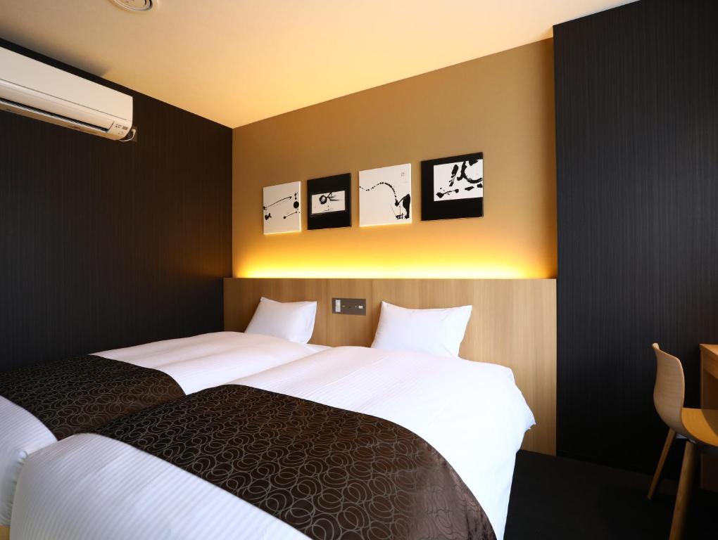 Postel nebo postele na pokoji v ubytování Hotel Wing International Kyoto - Shijo Karasuma