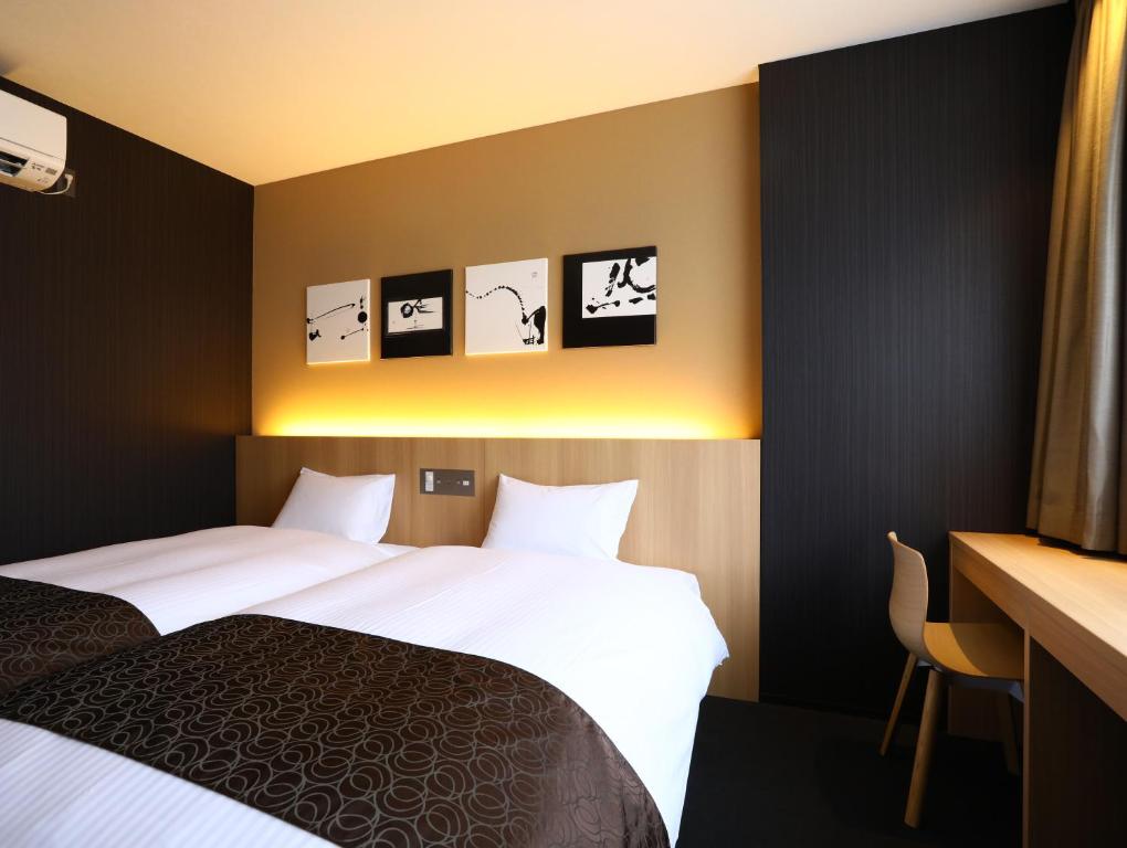Postel nebo postele na pokoji v ubytování Hotel Wing International Kyoto - Shijo Karasuma