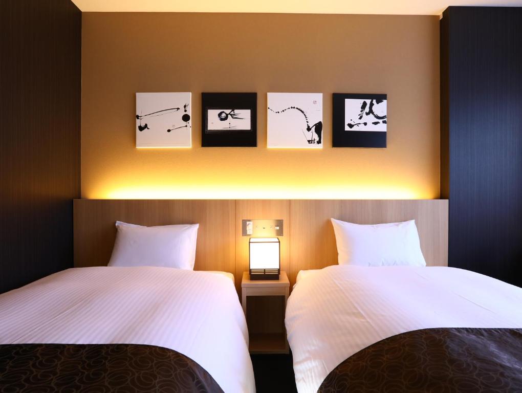 Postel nebo postele na pokoji v ubytování Hotel Wing International Kyoto - Shijo Karasuma