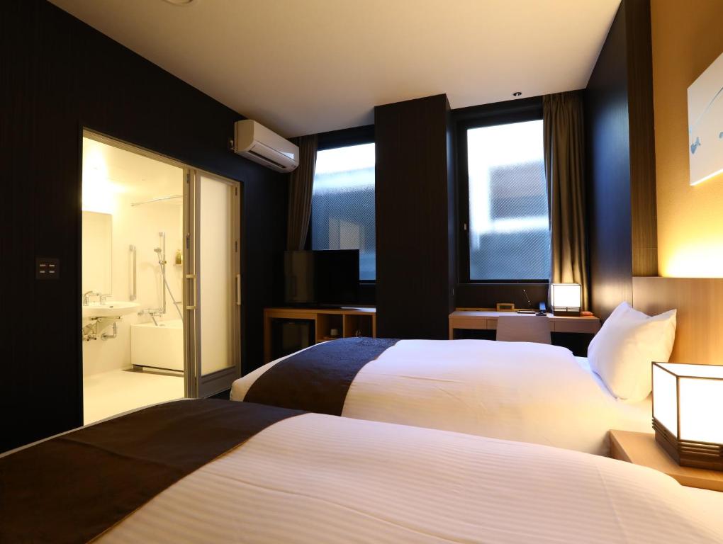 Postel nebo postele na pokoji v ubytování Hotel Wing International Kyoto - Shijo Karasuma