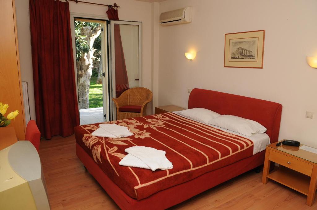 Posteľ alebo postele v izbe v ubytovaní Hotel Pantheon