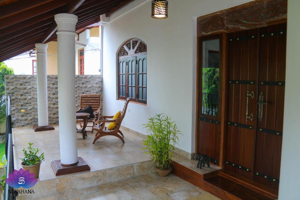 Patio nebo venkovní prostory v ubytování Nivahana Homestay