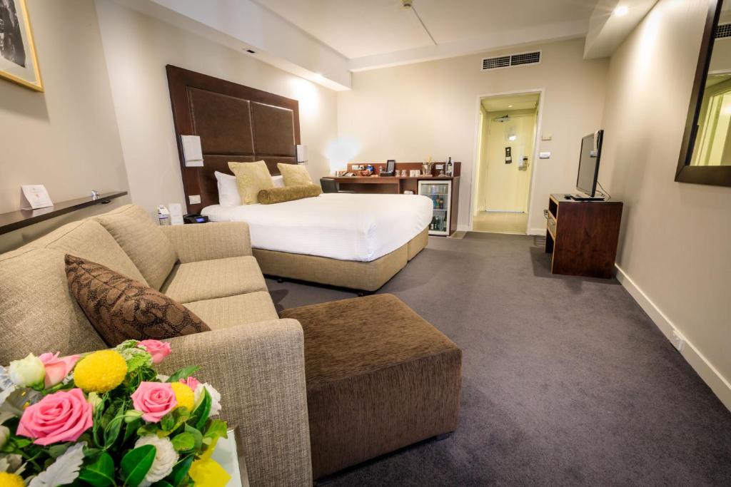 Postel nebo postele na pokoji v ubytování Amora Hotel Riverwalk Melbourne